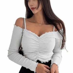 This white crop top offers unmatched versatility, perfect for layering or wearing solo. Its elegant design and flattering fit make it a must-have for modern, fashion-forward wardrobes.