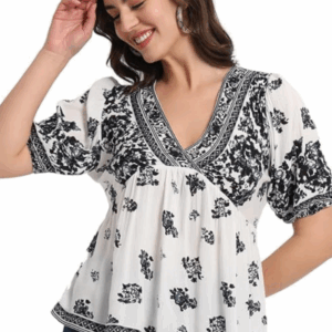 White short kurti with regular sleeves featuring a stylish printed design, perfect for casual and semi-formal occasions, made from breathable fabric offering comfort, elegance, and versatile everyday wear for women.