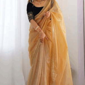 This elegant party wear saree blends modern finesse with traditional charm, offering lightweight comfort, intricate detailing, and versatile styling options that ensure you shine beautifully at every celebration or special occasion.