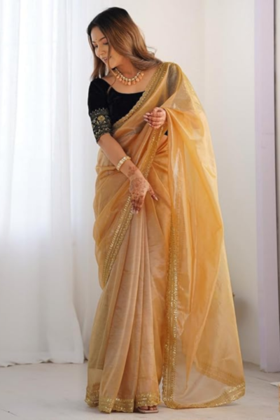 This elegant party wear saree blends modern finesse with traditional charm, offering lightweight comfort, intricate detailing, and versatile styling options that ensure you shine beautifully at every celebration or special occasion.