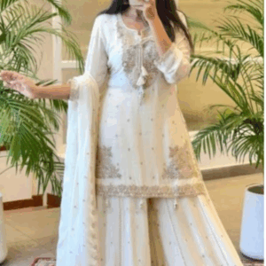 The ladies white suit features intricate embroidery and delicate silver embellishments, making it ideal for weddings, festive celebrations, or formal gatherings, offering a graceful and elegant look for every occasion.
